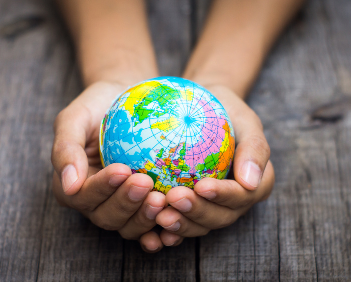 Globe in Hands